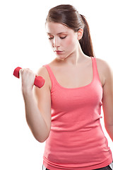 Image showing Beautiful sporty woman with dumbbells