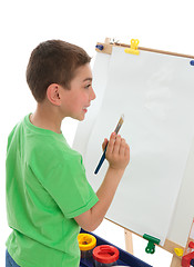 Image showing Boy reading to paint