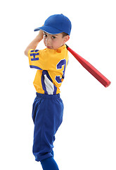 Image showing Boy swinging a baseball bat