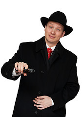 Image showing man in a black coat and hat