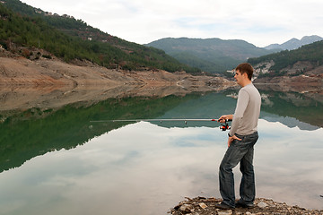 Image showing man with a fishing