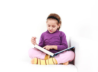 Image showing Girl reading