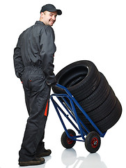 Image showing manual worker with handtruck