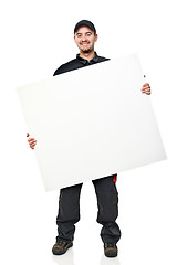 Image showing smiling worker with board