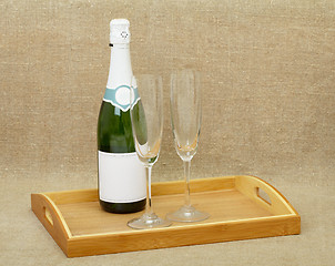 Image showing Champagne wine and glasses on wooden tray