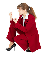 Image showing Woman sitting in combat stance