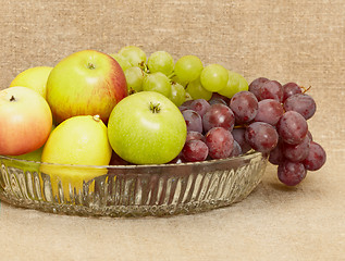 Image showing Fruit in vase - lemons, apples, grapes