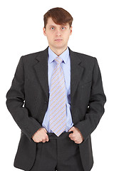 Image showing Young serious businessman on white background