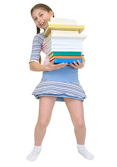 Image showing Ûchoolgirl has large stack of textbooks