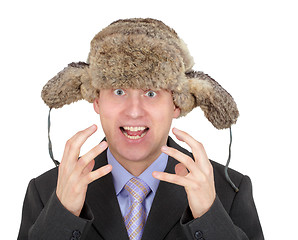 Image showing Emotional man on white with a winter hat on head