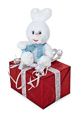 Image showing Toy white rabbit sitting on gift