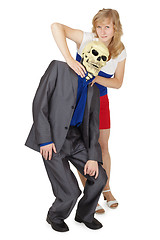 Image showing Girl choking man in mask of death