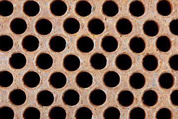 Image showing Rusty iron grate - element of industrial heat exchanger