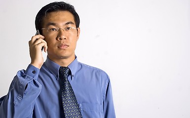 Image showing Asian Businessman with Phone