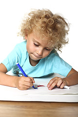 Image showing kid drawing on floor