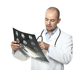Image showing young doctor check tomography result