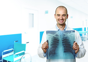 Image showing smiling doctor with xray