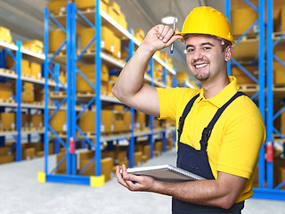 Image showing smiling worker in warehouse