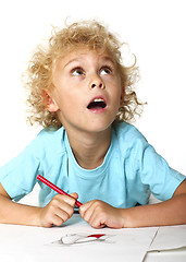 Image showing little kid drawing and thinking