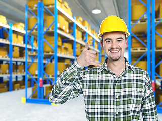 Image showing smiling worker in warehouse