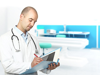 Image showing caucasian doctor writing