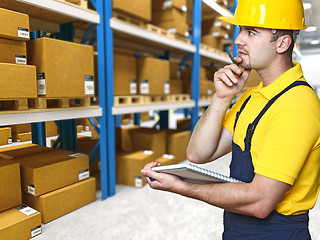 Image showing warehouse and manual worker