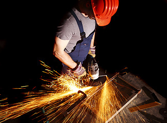 Image showing manual worker with grinder