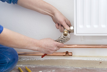 Image showing plumber radiator