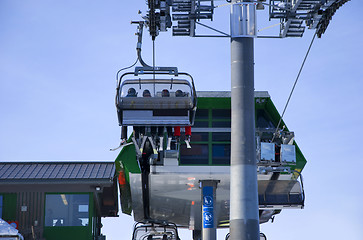 Image showing skiing people in ski lift