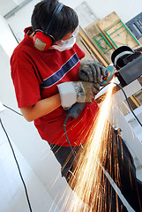 Image showing metal worker with grinder