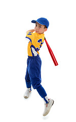 Image showing Young child swinging a baseball bat