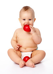 Image showing Little child with apple