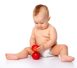 Image showing Little child with apple