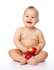 Image showing Little child with apple