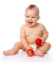 Image showing Little child with apple