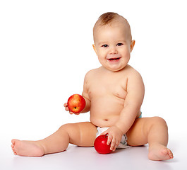 Image showing Little child with apple