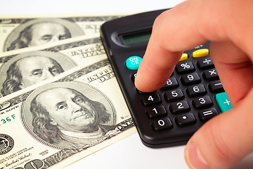 Image showing Calculator and money - accounting concept