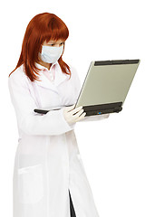 Image showing Health worker uses laptop for work
