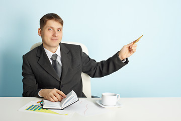 Image showing Businessman shows direction