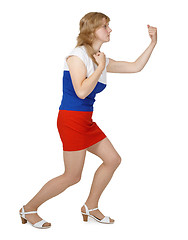 Image showing Girl beats fist on white background