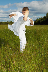 Image showing Man polish a kick - karate