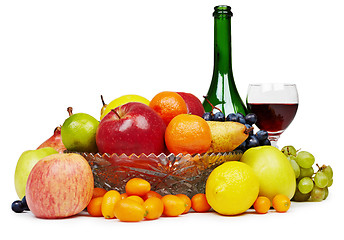 Image showing Ðruit and wine bottle - still-life