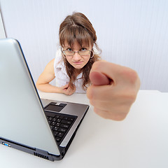 Image showing Woman bookkeeper cocks a snook in a pay day