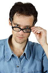 Image showing Young disheveled man in glasses