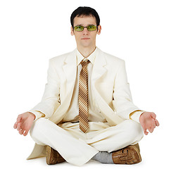 Image showing Businessman in light suit - original way relaxes