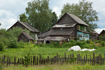 Image showing Old dilapidated rustic wooden houses