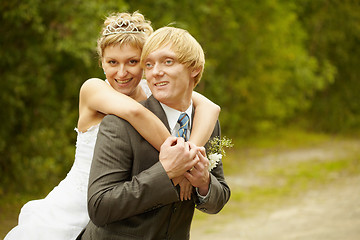 Image showing Happy young bride and groom