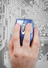 Image showing Hand and computer mouse on electronic background