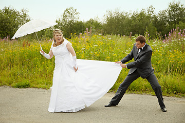 Image showing Bride and groom having fun