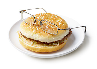 Image showing Amusing sandwich in spectacles isolated on a white background